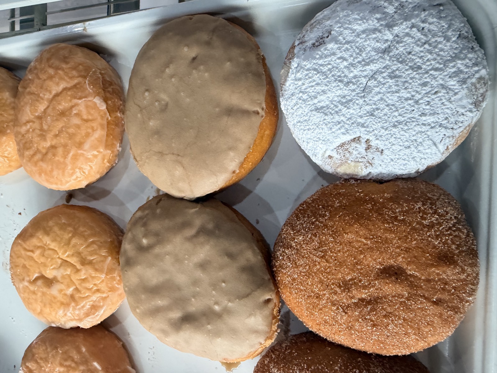 Fresh filled and powdered donuts