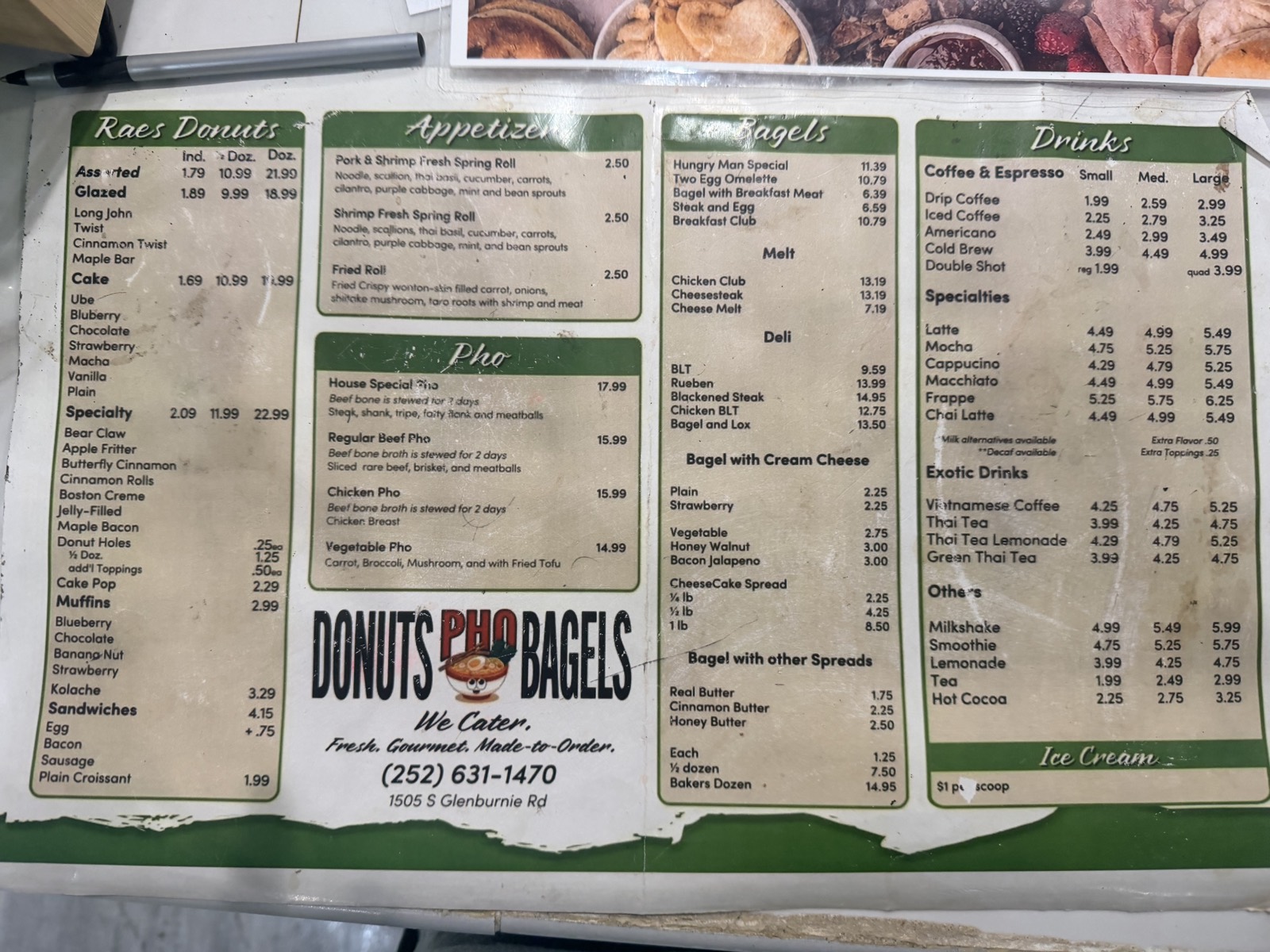 Donuts Pho Bagels in-store menu board